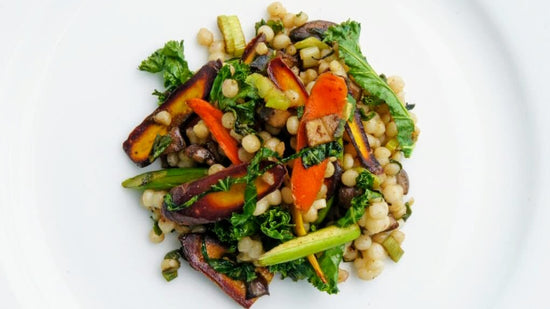 Pearl couscous with vegetables and garlic scapes